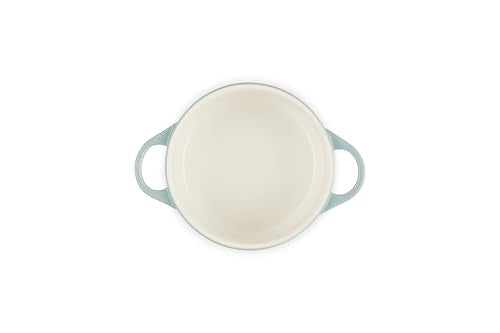 Le Creuset open-lid shot emphasizing comfortable handle and stackable design
