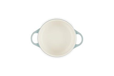 Le Creuset open-lid shot emphasizing comfortable handle and stackable design
