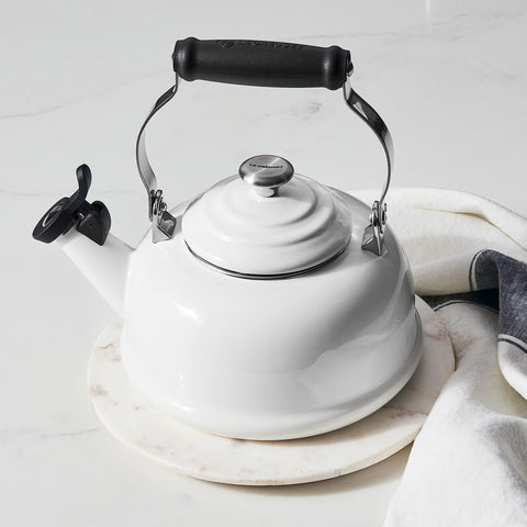Le Creuset 1.7 qt kettle with handle and knob.