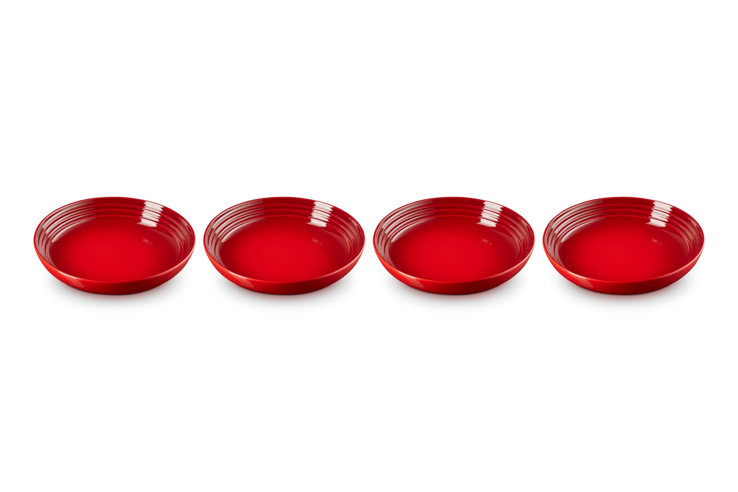 Le Creuset pasta bowls cerise showcase vibrant glaze for daily pasta servings.