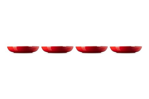 Le Creuset pasta bowls cerise stacked neatly for compact storage and easy access.