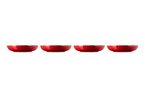 Le Creuset pasta bowls cerise stacked neatly for compact storage and easy access.