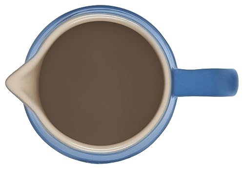 Le Creuset Marseille pitcher interior glaze eases cleaning