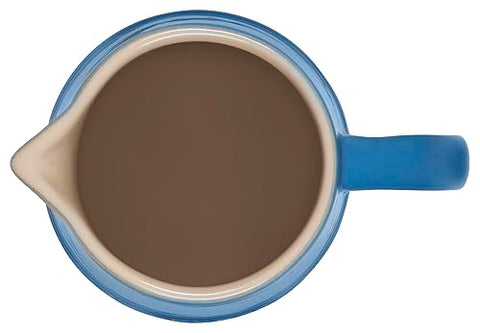 Le Creuset Marseille pitcher interior glaze eases cleaning