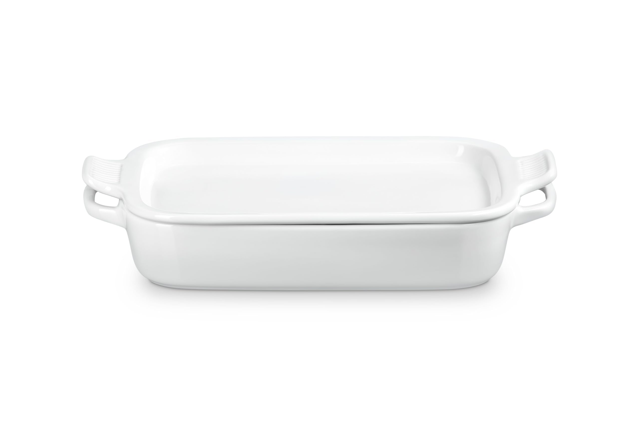 Le Creuset rectangular dish with platter lid in white for oven-to-table serving.