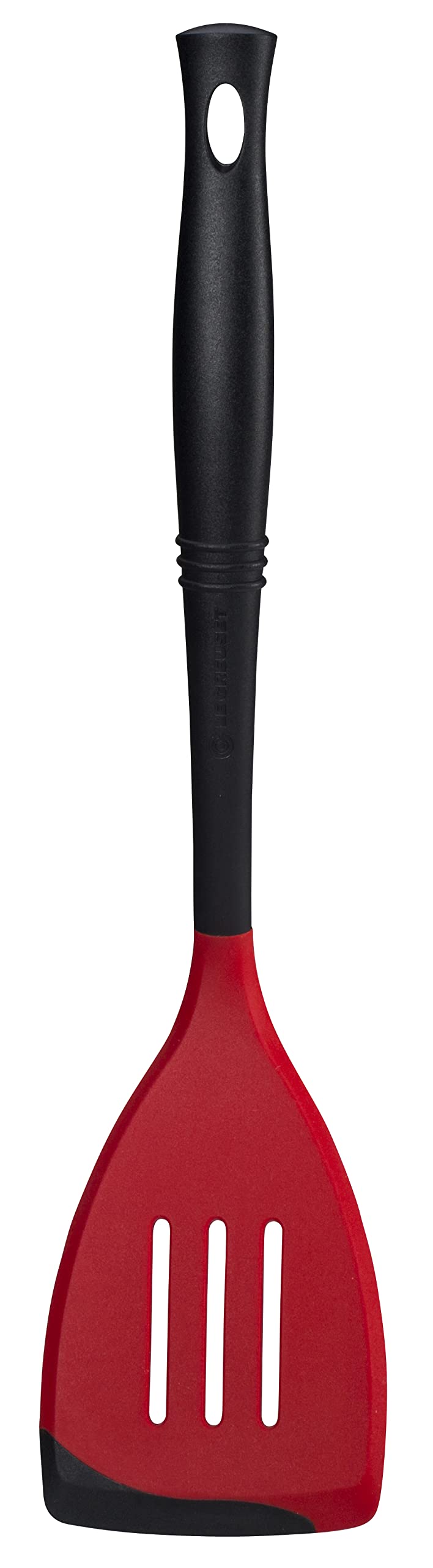 Le Creuset Revolution bi-material spatula front view shows durable nylon core and heat-resistant silicone edge.