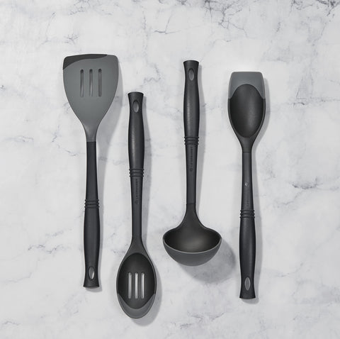 Le Creuset Revolution spatula, ergonomic elliptical handle for comfort and control in nonstick pans.