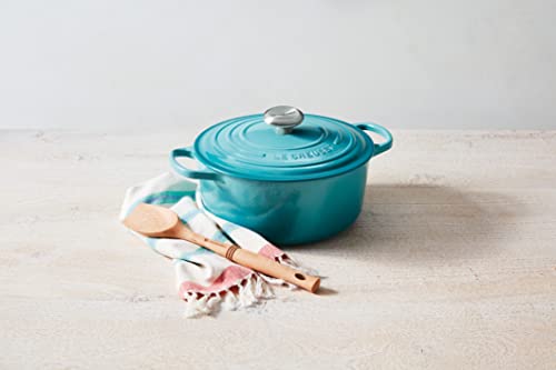 Le Creuset Revolution spoon with elliptical handle, comfortable grip for flipping and deglazing