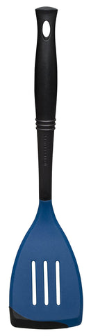 Le Creuset Revolution slotted spatula bi-material head for safe, easy turning of delicate foods.