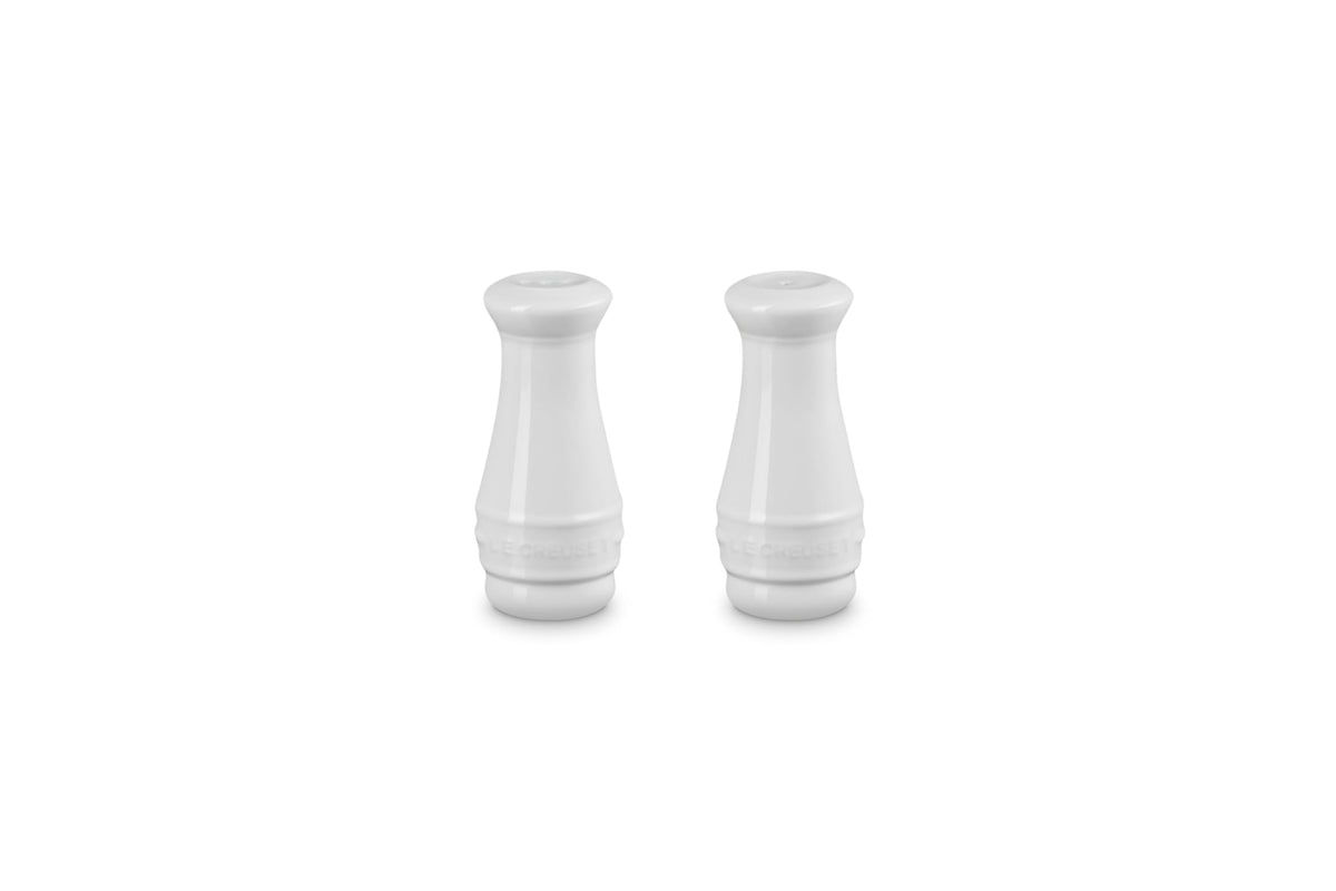 Le Creuset salt and pepper shaker set in white on display, ideal for everyday seasoning.