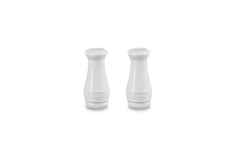 Le Creuset salt and pepper shaker set in white on display, ideal for everyday seasoning.