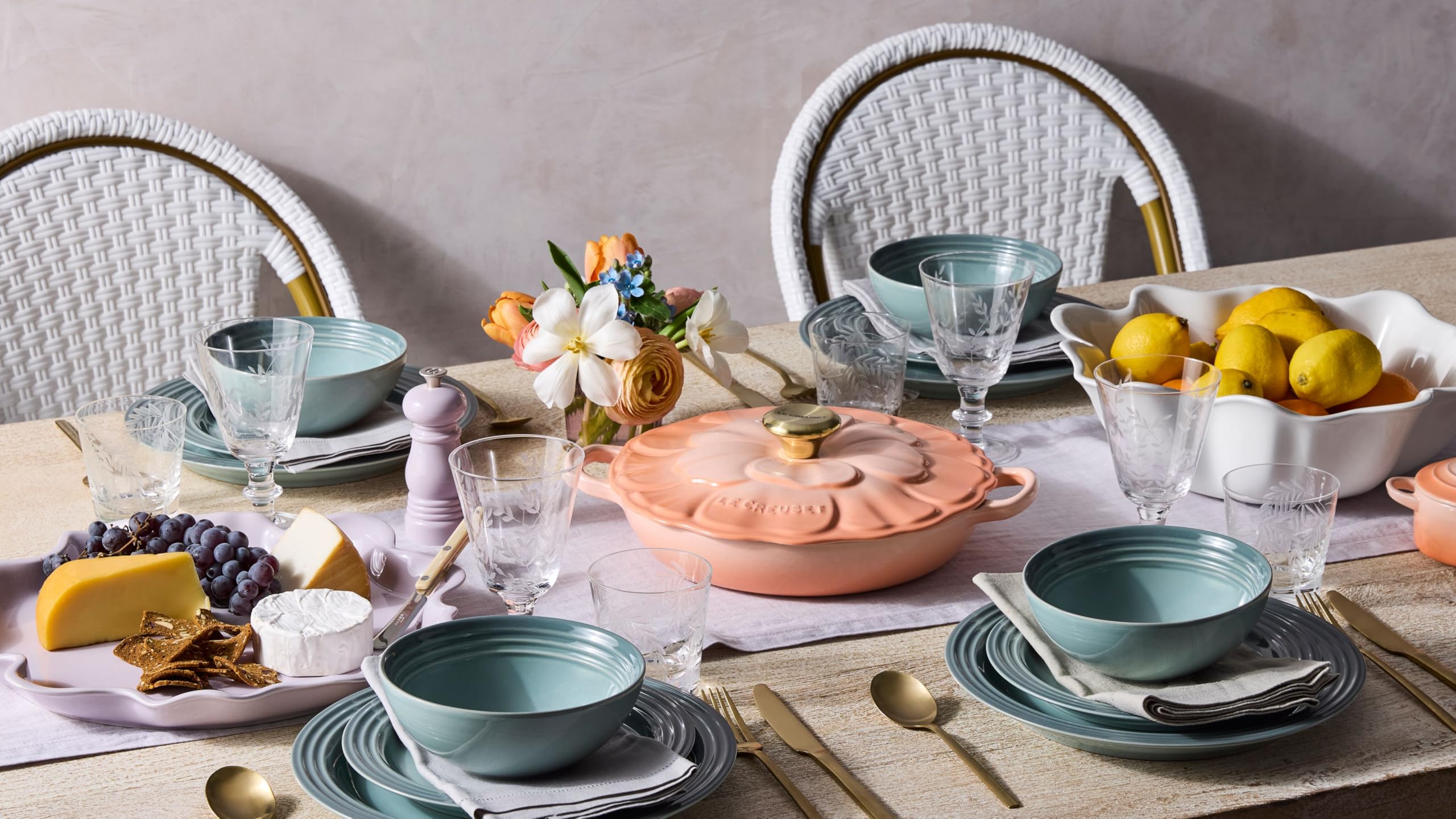 Le Creuset smooth rim and secure grip aid gentle serving and sauce containment.