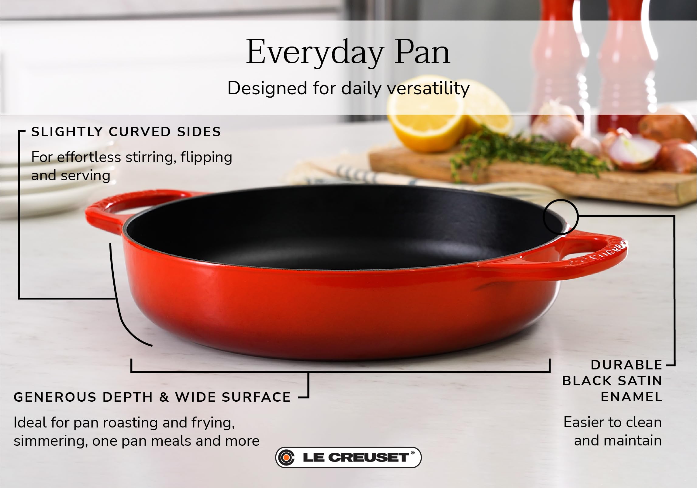 Le Creuset Signature pan with ergonomic handles for secure lifting.