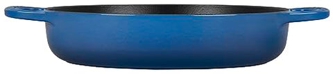 Le Creuset Signature cast iron Marseille; interior enamel close-up showing patina development.
