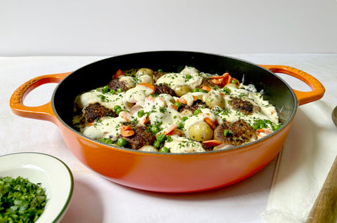 Le Creuset Marseille pan; oven-to-table setup showcases easy transfer from stove to table.
