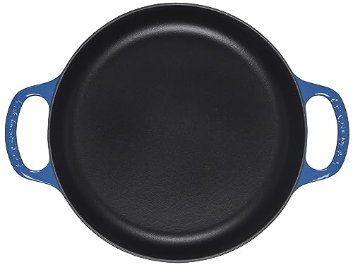 Le Creuset Signature Marseille pan; overhead view emphasizes wide surface for pan roasting.