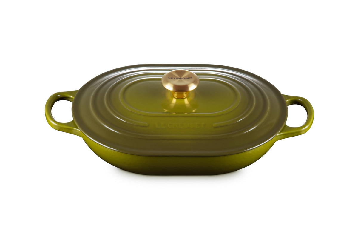 Le Creuset Signature oval casserole in olive ready for use with even heat distribution.