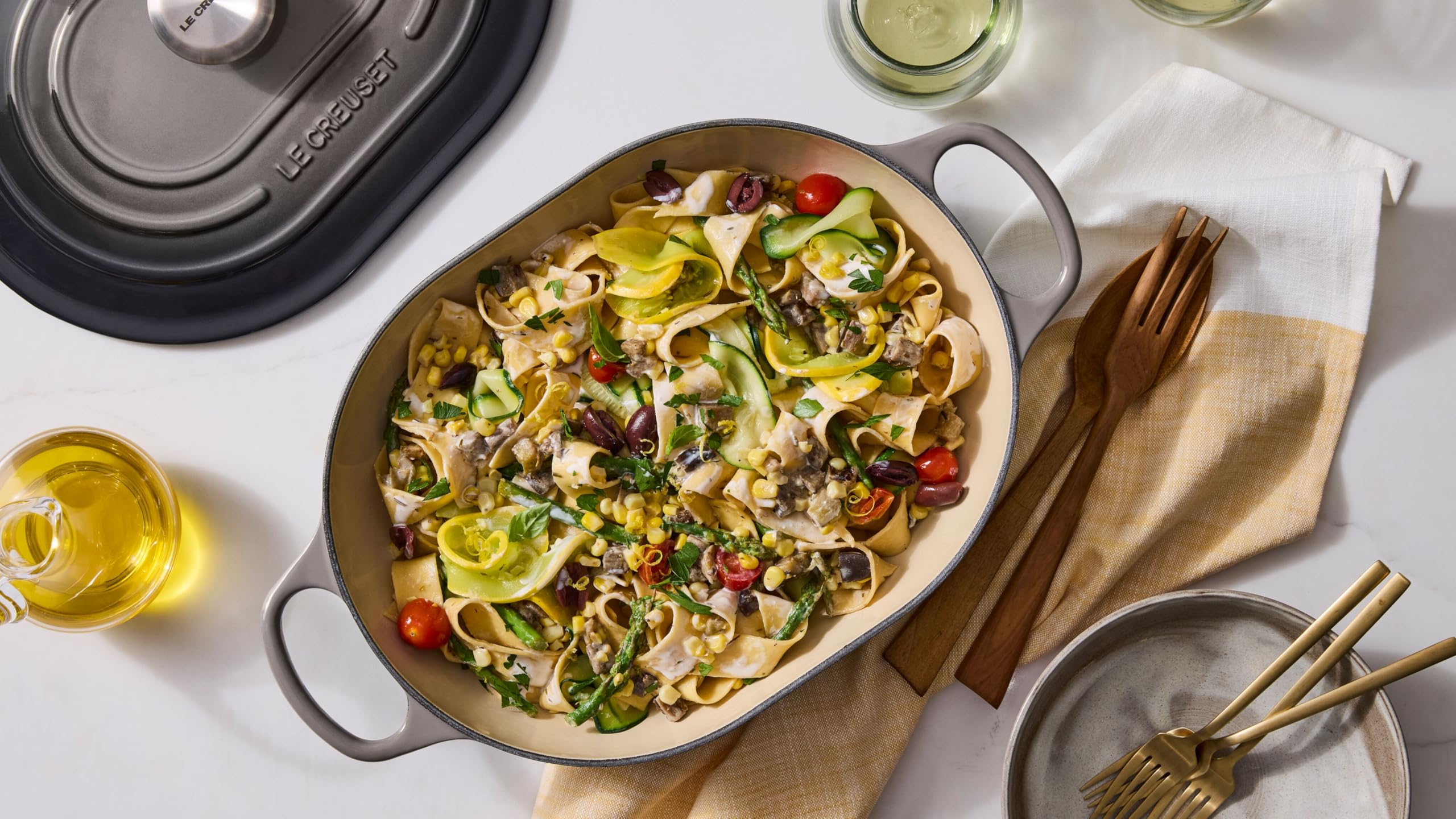 The Le Creuset Artichaut color close-up showcases vibrant, heat-retaining enamel.