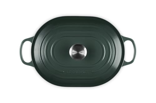 The Le Creuset Oval Casserole interior in Artichaut highlights easy-to-monitor cooking progress.