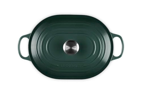 The Le Creuset Oval Casserole interior in Artichaut highlights easy-to-monitor cooking progress.