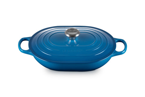 Le Creuset Signature Oval Casserole with Marseille lid ready for oven use and serving.