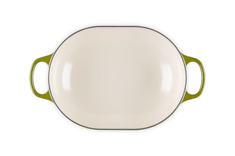 Inside view of Le Creuset olive casserole showing light interior for monitoring.
