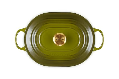Le Creuset olive oval casserole with lid on for moisture-rich roasts.