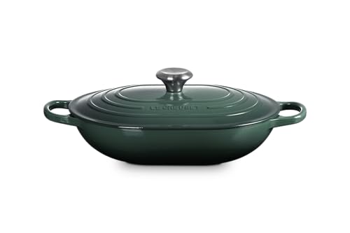 The Le Creuset oval casserole on a dining table is ready to serve family meals.