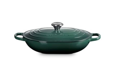 The Le Creuset oval casserole on a dining table is ready to serve family meals.