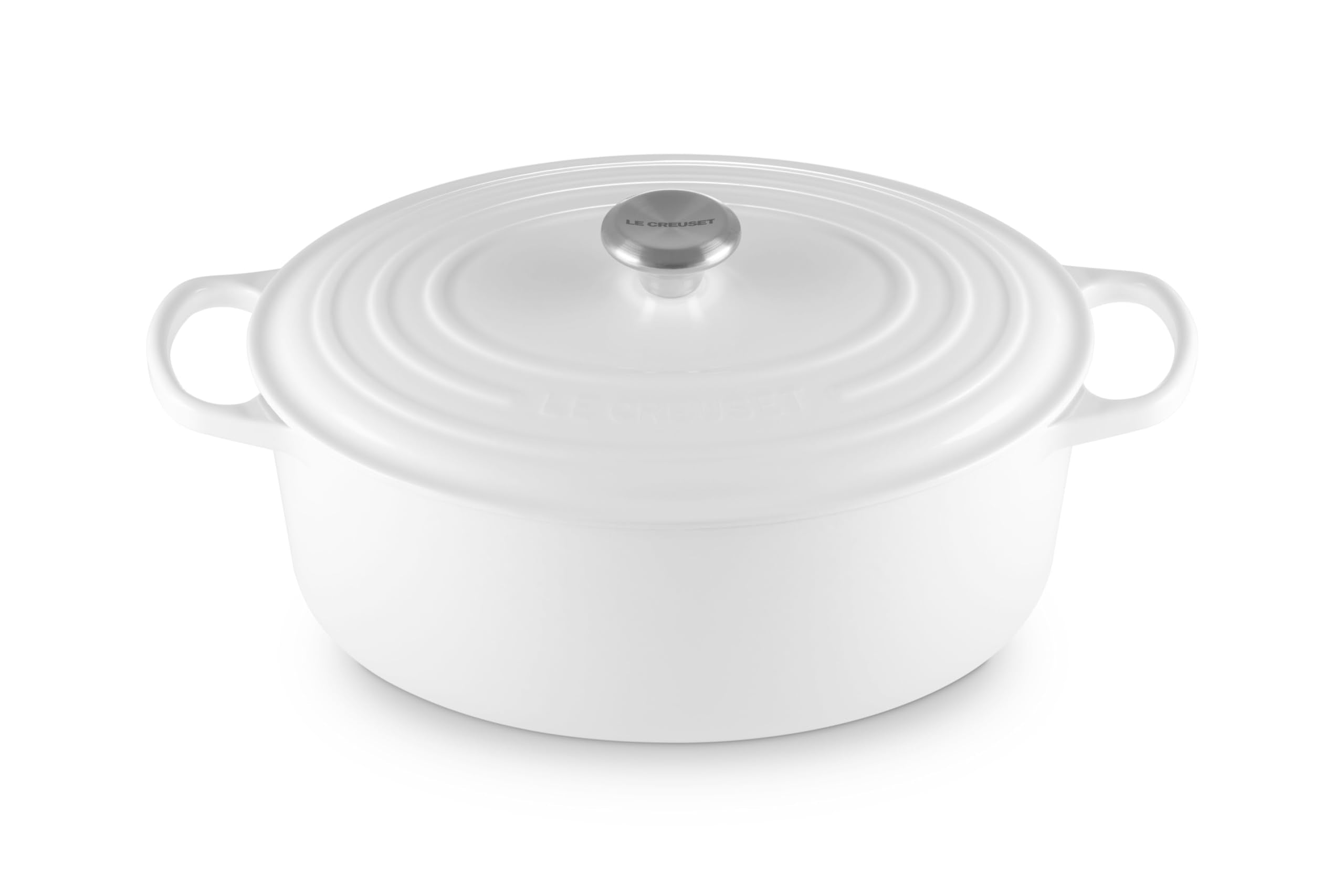Le Creuset Signature oval Dutch oven 8qt white, ideal for stove-to-table cooking.
