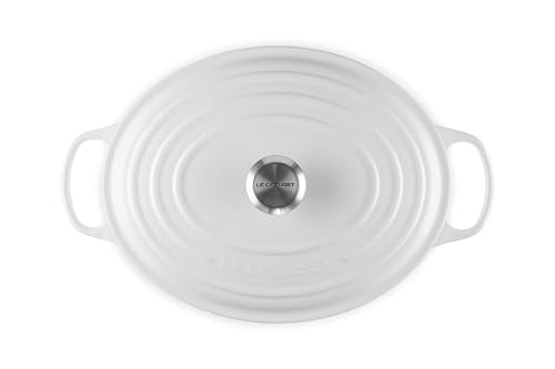 Inside view of Le Creuset Signature oval Dutch oven showing light interior enamel.