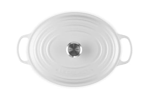 Inside view of Le Creuset Signature oval Dutch oven showing light interior enamel.