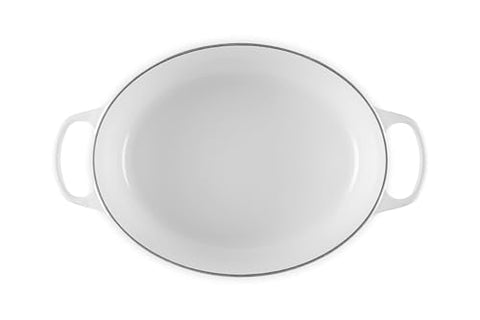 Le Creuset Signature lid with ergonomic knob demonstrates secure seal for moisture-rich braises.