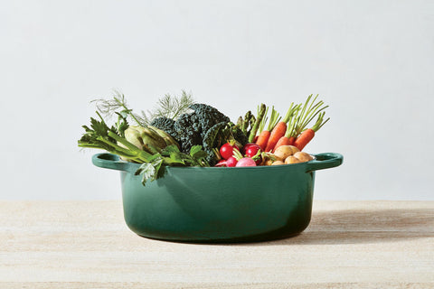 Le Creuset Signature oven-safe up to 500°F supports slow cooking, braising, and baking.