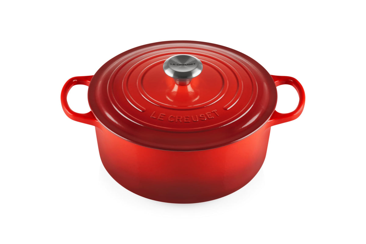 Le Creuset Signature Round Dutch Oven Cerise, 5.5 qt, delivers even heat for braises.