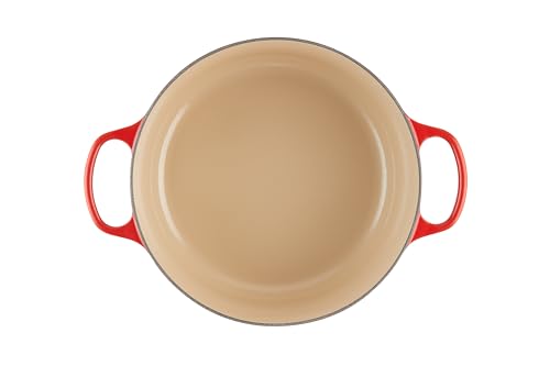 Le Creuset cerise dutch oven on stove, ideal for slow cooking