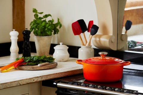 Le Creuset dome-shaped lid circulates heat for even cooking