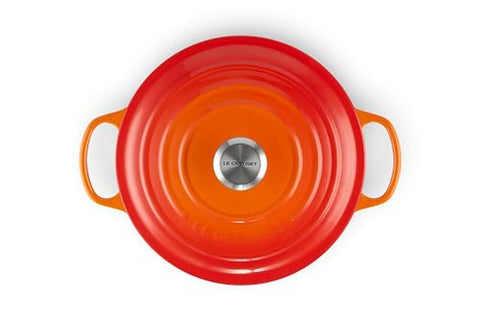 Le Creuset with easy-grip handles for comfortable lifting from hob to table