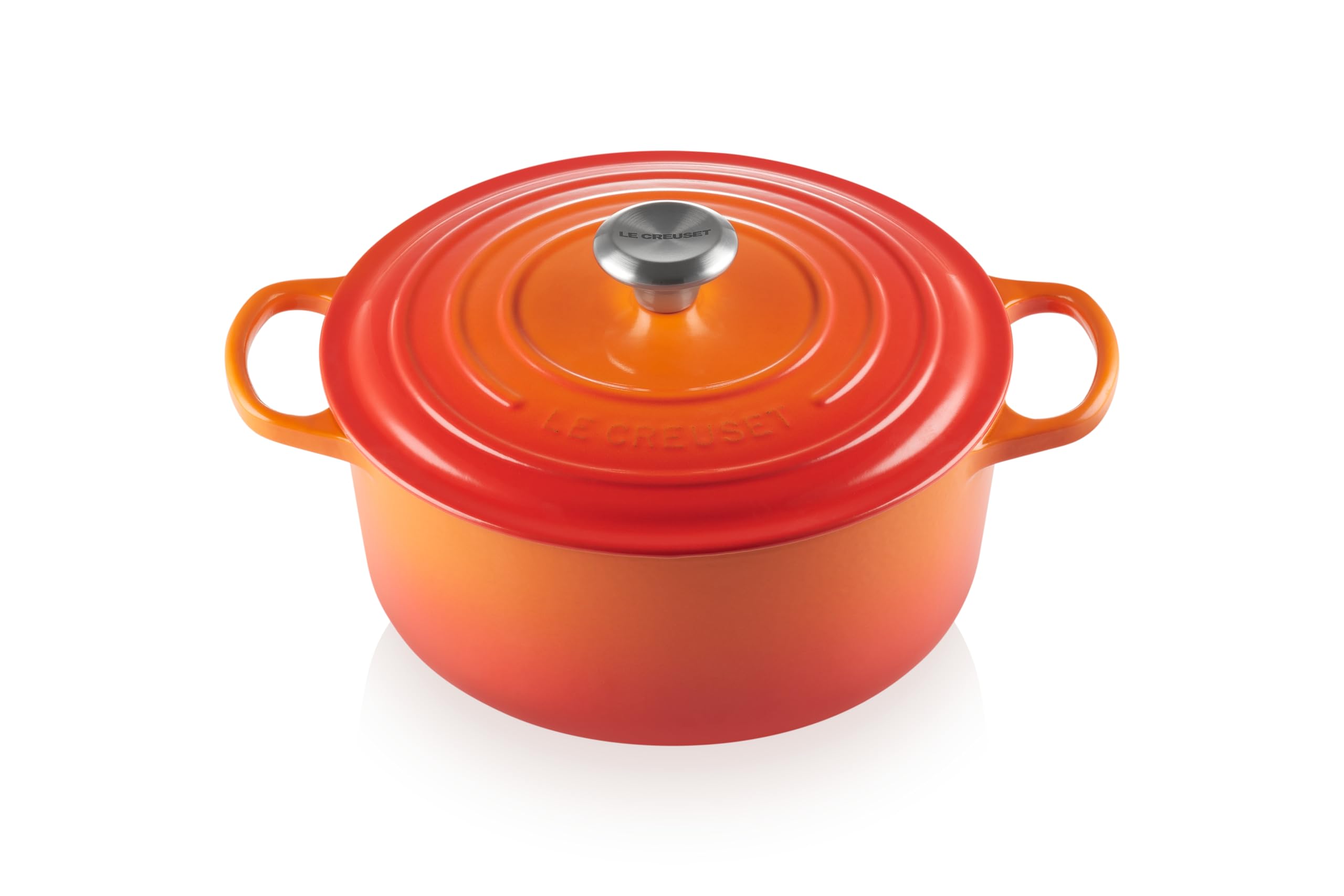 Le Creuset Signature Dutch Oven in Flame color showing vibrant exterior and heat retention