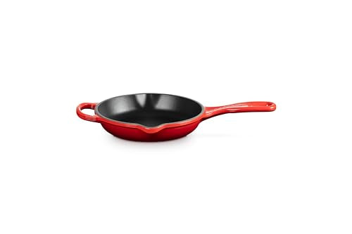 Le Creuset satin enamel interior close-up for easy release and cleanup.