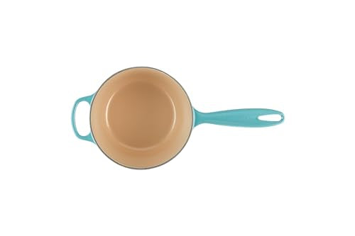 Le Creuset Signature saucepan ergonomic handles for easy lifting.