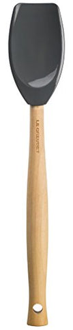 Le Creuset silicone basting brush that spreads sauces smoothly and cleans easily.