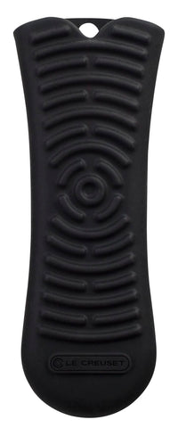 Le Creuset silicone cool tool handle in black offers a heat-resistant, secure grip on hot cookware.