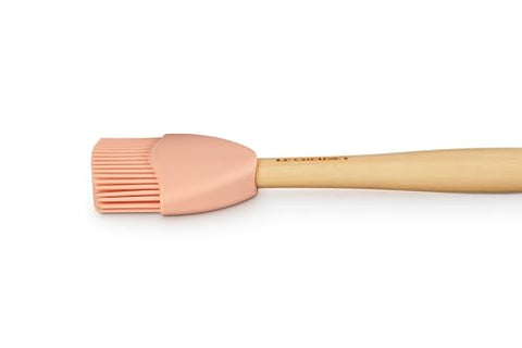 Le Creuset silicone craft basting brush with wood handle in Peche for grip