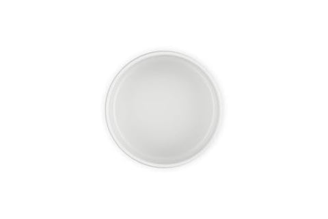 Le Creuset wooden lid acacia construction supports secure stackable storage.