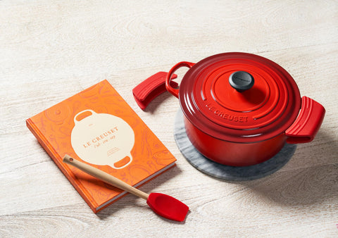 Le Creuset Sea Salt silicone grips are oven-friendly and color-matching.