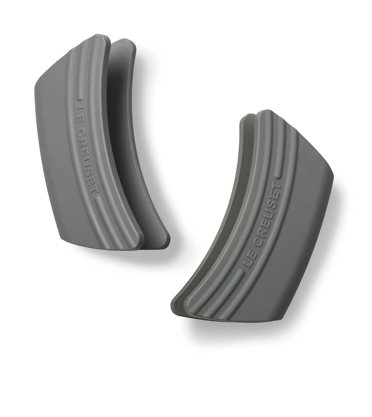 Le Creuset silicone handle grips Oyster color provide secure grip and hand protection during cooking.