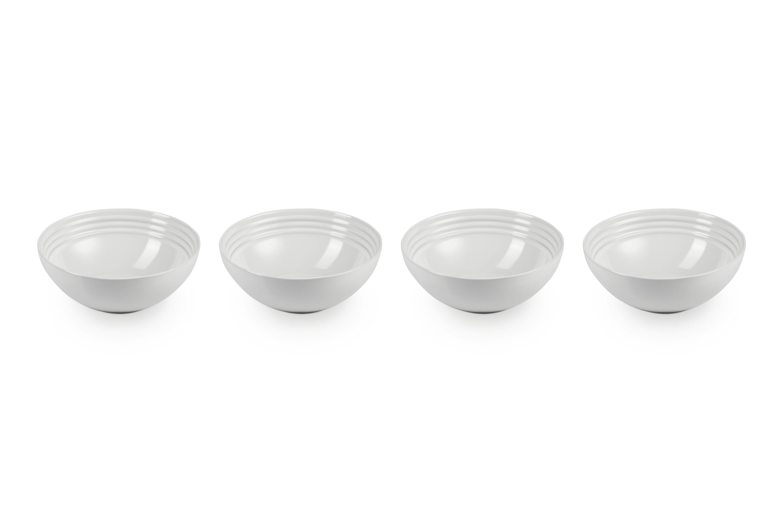 Le Creuset soup bowls 22oz white set of four on a table for entertaining meals.
