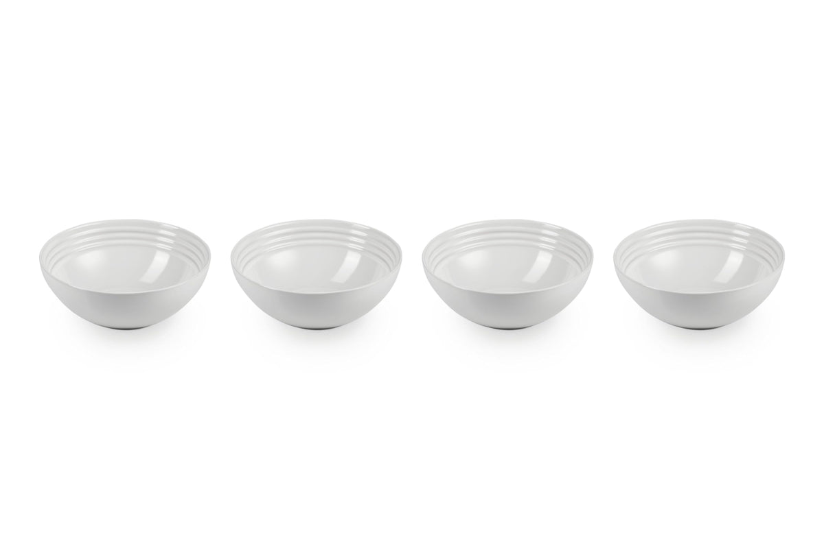 Le Creuset soup bowls 22oz white set of four on a table for entertaining meals.
