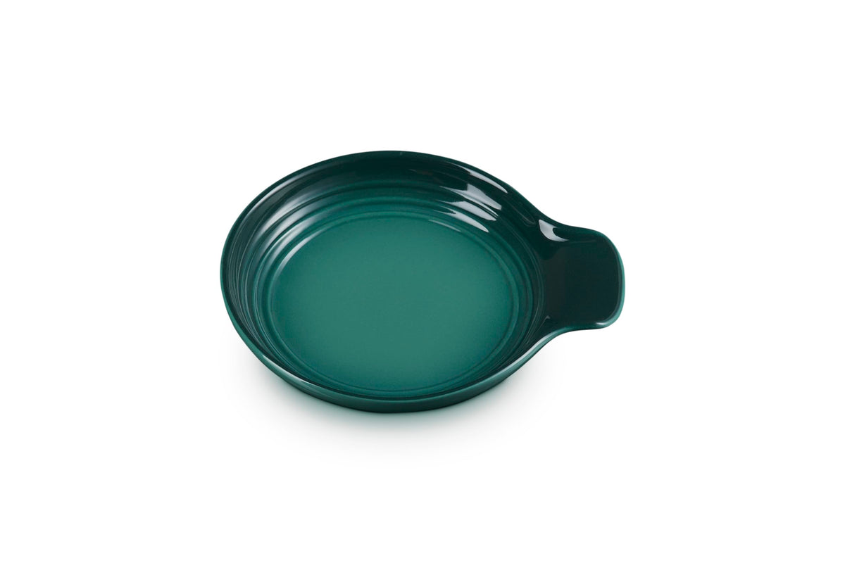 Le Creuset Signature Spoon Rest Artichaut in full view, keeps counters clean while adding color to table settings.